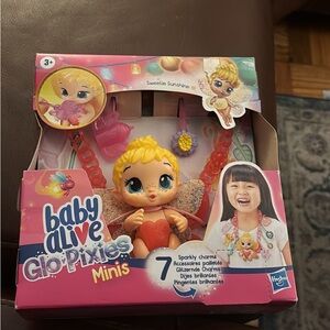 Baby Alive Glo Pixies Minis - Sweetie Sunshine Doll with Red Heart